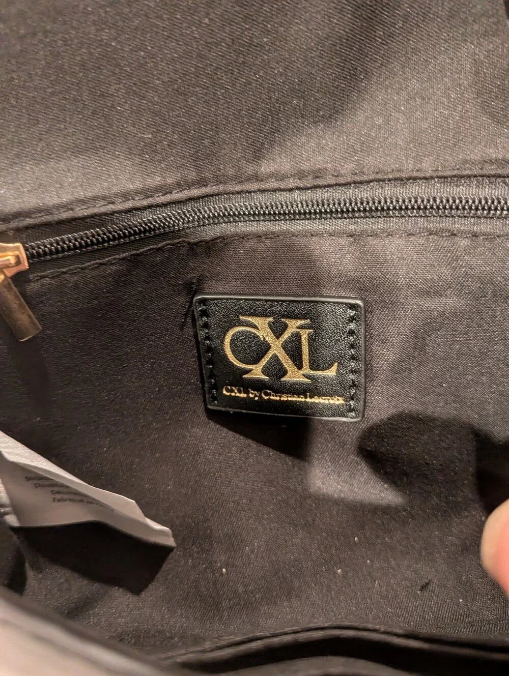 Christian Lacroix compact wristlet